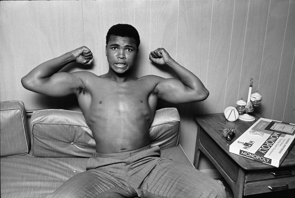 Muhammad Ali (Cassius Clay). Muscles. Louisville, Kentucky. 1963
 Steve Schapiro © All Rights Reserved.