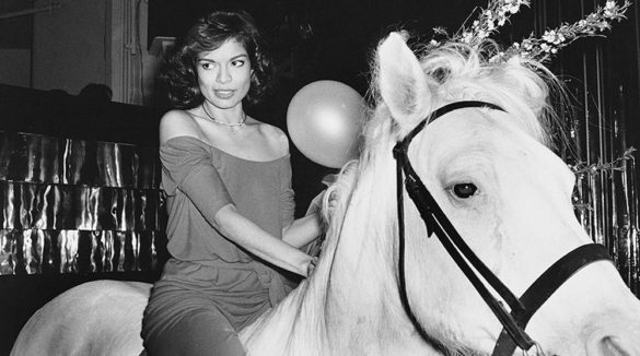 Rose Hartman (American, born 1937). Bianca Jagger Celebrating her Birthday, Studio 54, 1977. Black and white photograph. Courtesy of the artist. © Rose Hartman