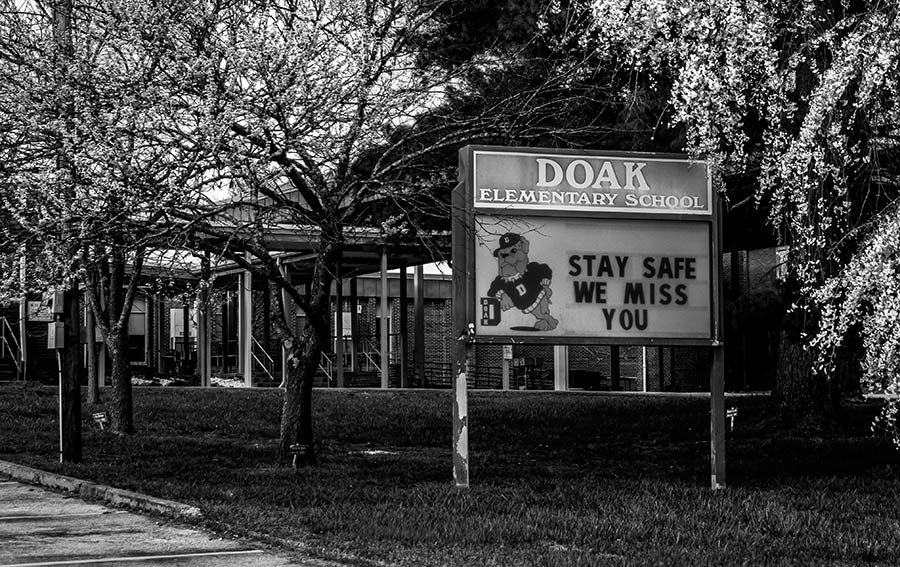 As the schools closed the students, parents, and teachers worked to find a new normal such as developing distant learning programs for online classes.  The sign at Doak Elementary School in Tusculum, TN, reflects the unknown duration of the closure; there is no return date such as, "we will see you after spring break."  Copyrights to Eric Kaltenmark © All rights reserved.