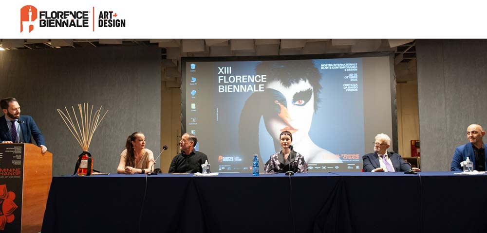 At the event of XIII Florence Biennale, took place from 23 to 31 October 2021 at Fortezza da Basso in Florence, Italy. 
Left to Right: JACOPO CELONA, General Director, Florence Biennale
Dafna Navarro, CEO& Founder, Editor-in-Chief, Lens Magazine & Art Market Magazine
Miguel Bermudez, Art Market Magazine's journalist (2016-2021)
Flora Borsi, presented at the Florence Biennale
PIERO CELONA, Vice President and Founder, Florence Biennale
GIOVANNI CORDONI, Event Manager, Florence Biennale