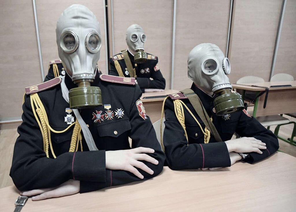Young people train to wear gas masks at a military academy in Kyiv. Since the beginning of the conflict between the pro-Russian separatists of the Donbas and the Ukrainian government forces, the military schools have been sold out, Kyiv, Ukraine, January 2018.
Aude Osnowycz © All rights reserved.