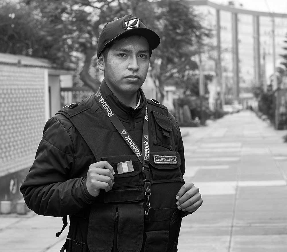 The neighborhood watchman. A common informal profession in Peru that arose from the lack of  public surveillance. 
ISO 400, 1/400, f/8, 85 mm, manual exposure. 
Sony a99, Zeiss Planar 85 mm F1.4 
Software: Capture One 10


Carlos Paz-Bordone © All rights reserved. 
