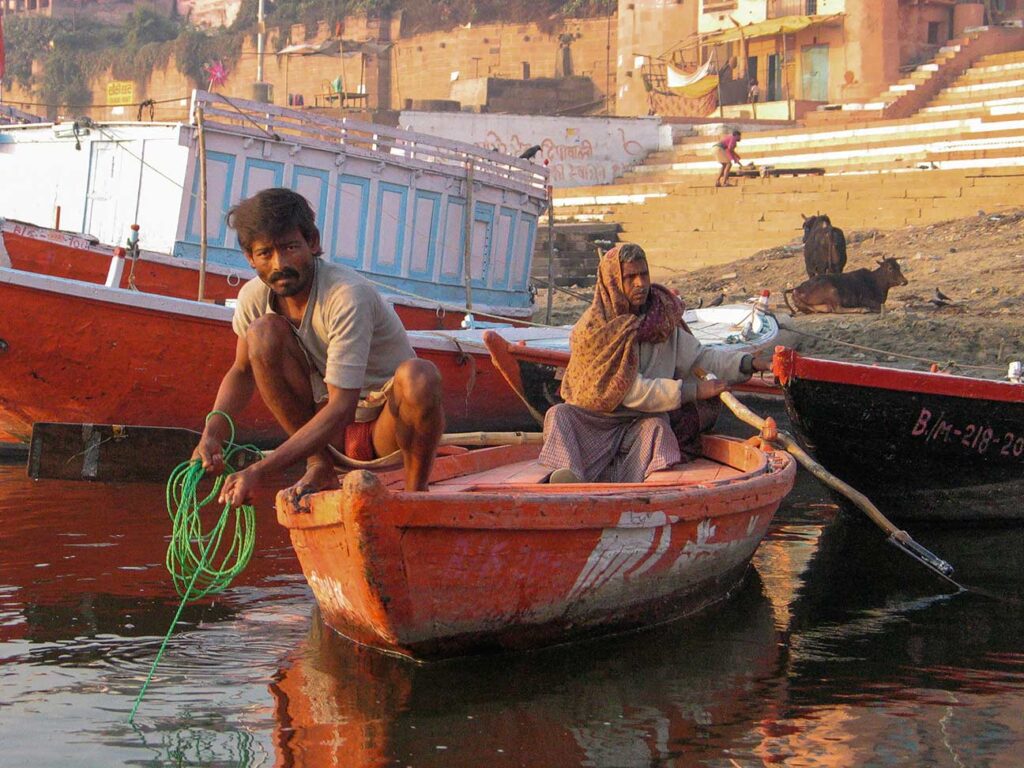 On the Sacred Ganges. Boatmen prepare their departure, Varanasi, India. 
Cody Albert © All rights reserved. 