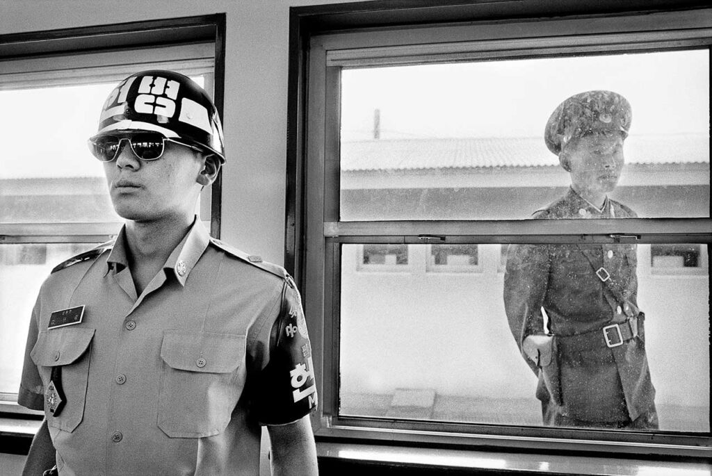South Korean and North Korean soldiers in the DMZ at Panmunjom.