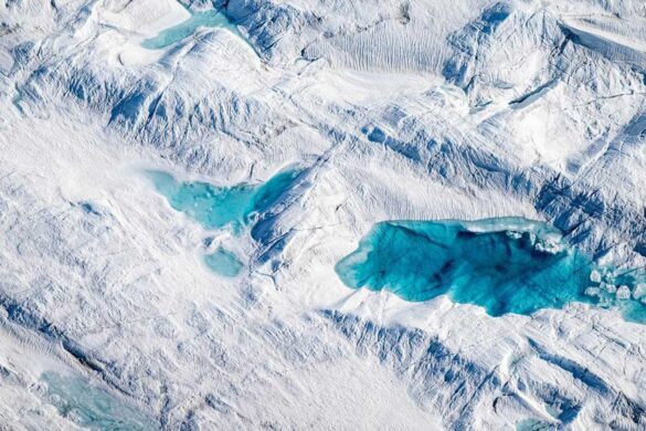 Supraglacial lakes are like natural laboratories that offer insights into meltwater production, glacier flow, heat absorption, and the response of glaciers to warming temperatures. Erin Towns © All rights reserved.
