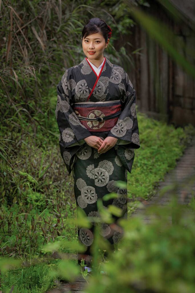 Musician Marina Hirata in a traditional Amami kimono near the late artist Isson Tanaka's historic home. Mark Edward Harris © All rights reserved.