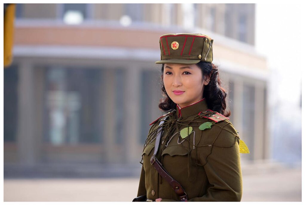 Photograph recreated from the film "A Diploma of Graduation" (2016) produced by the Korean Feature Film Studio. Heroine Pak Su Hyang (34) graduated from Pyongyang University of Dramatic and Cinematic Art. 