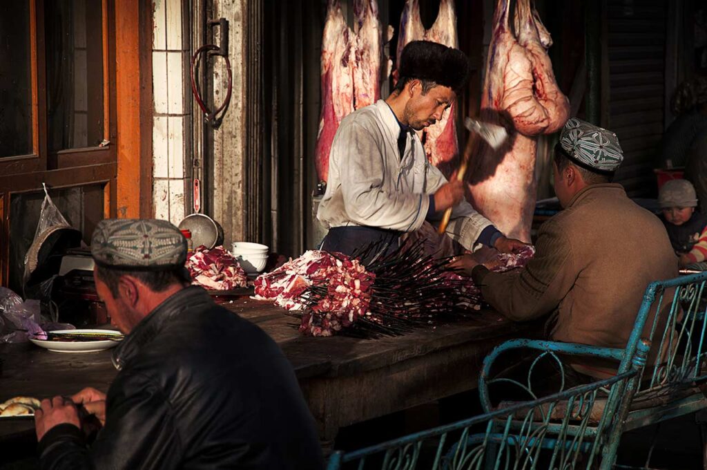The Butcher
A butcher prepares cuts of meat to cook in his restaurant or sell in the open market near the central mosque.