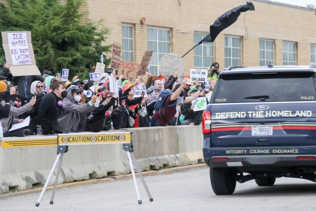 Broadview’s Stand #14
Protesters shout at vehicles arriving at the ICE detention facility on 25th Street and Harvard in Broadview, IL, USA. In October, the Broadview Mayor issued executive orders to limit protest activity near the ICE facility after demonstrations grew chaotic and led to multiple arrests. Concrete barriers were installed, and protests are restricted to designated "safety zones."
Alexandra Buxbaum © All rights reserved.