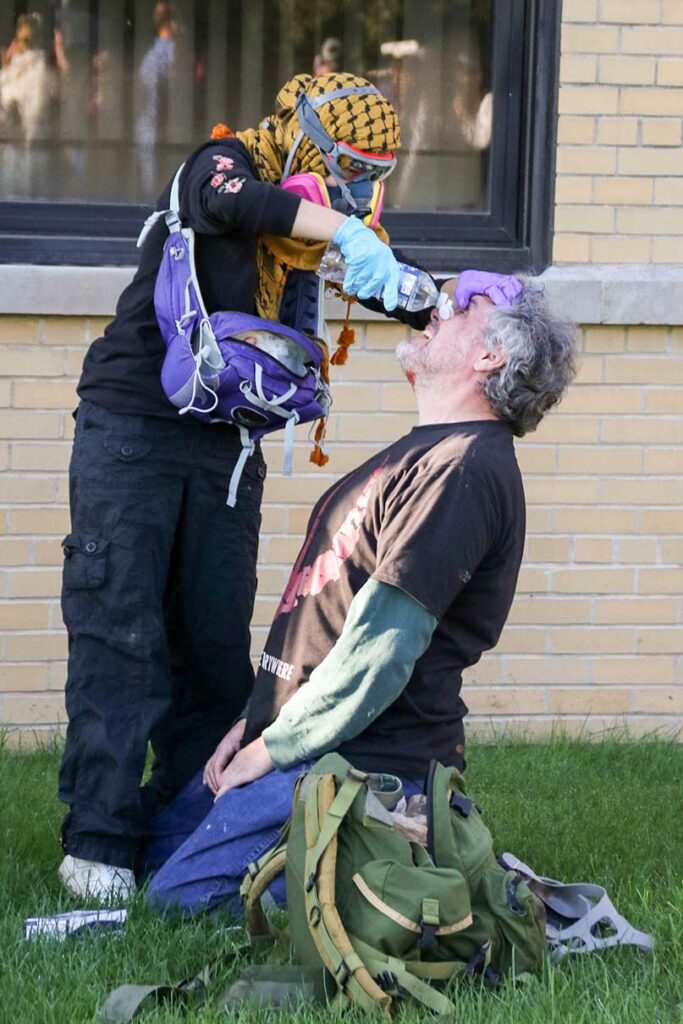 Right: Broadview’s Stand #10
A protester overcome with tear gas gets his eyes flushed out with water by a fellow protester at the side entrance of the ICE detention facility on 25th street and Harvard in Broadview, IL, USA.
Alexandra Buxbaum © All rights reserved