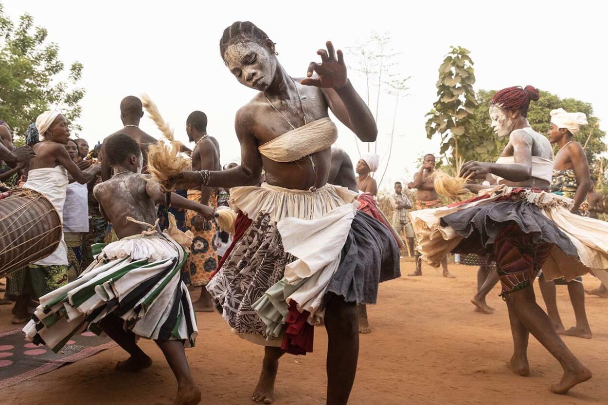 Dancing energetically in the dust during a traditional healing ceremony of Sakpata in remote Benin.
Inger Vandyke © 
All rights reserved. 