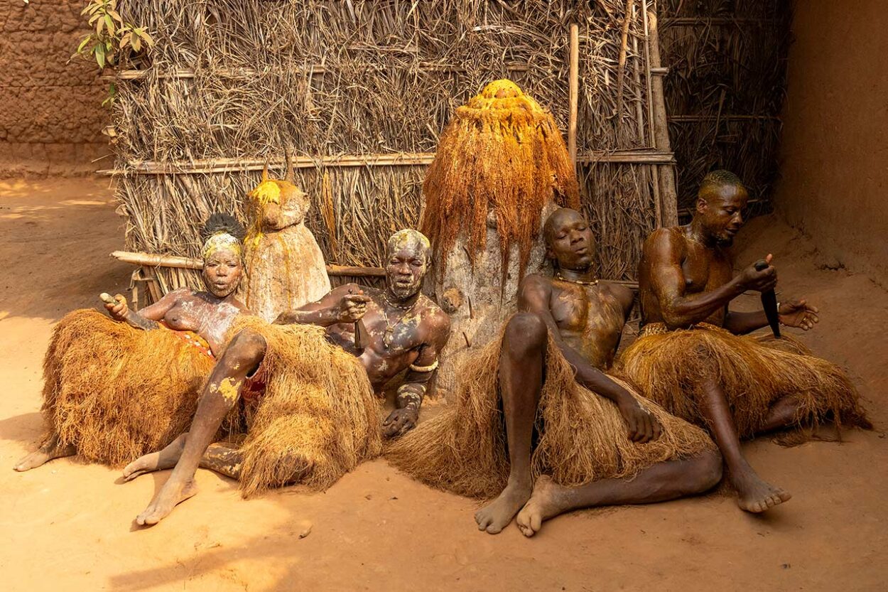 Koku devotee
A painted devotee of Koku.  The signature body paint is created from yellow palm oil and kaolin powder. Yellow is the main color of Koku in Voodoo religion.
Inger Vandyke ©  All rights reserved. 