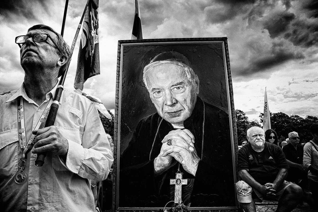 Participants in the Feast of the Assumption of the Blessed Virgin Mary  procession carry a monumental portrait of Servant of God Cardinal Stefan  Wyszyński (1901–1981), the Primate of Poland.  
Arkadiusz Kubisiak © All rights reserved. 