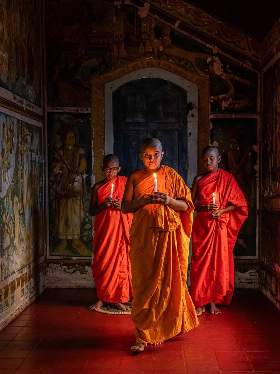 Candle Procession
Three young Buddhist novices hold candles inside a monastery in Sri Lanka. In Buddhist practice, light is often associated with clarity, offering, and devotion, turning this quiet procession into part of a broader spiritual education.
Thibault Gerbaldi © All rights reserved