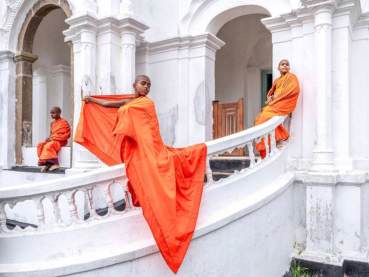 Novices in the cloister
Young Buddhist novices gather on the white steps of a monastery in Galle, Sri Lanka. Their saffron robes mark the beginning of monastic training, where religious education, discipline, and community life are passed from one generation to the next.
Thibault Gerbaldi © All rights reserved